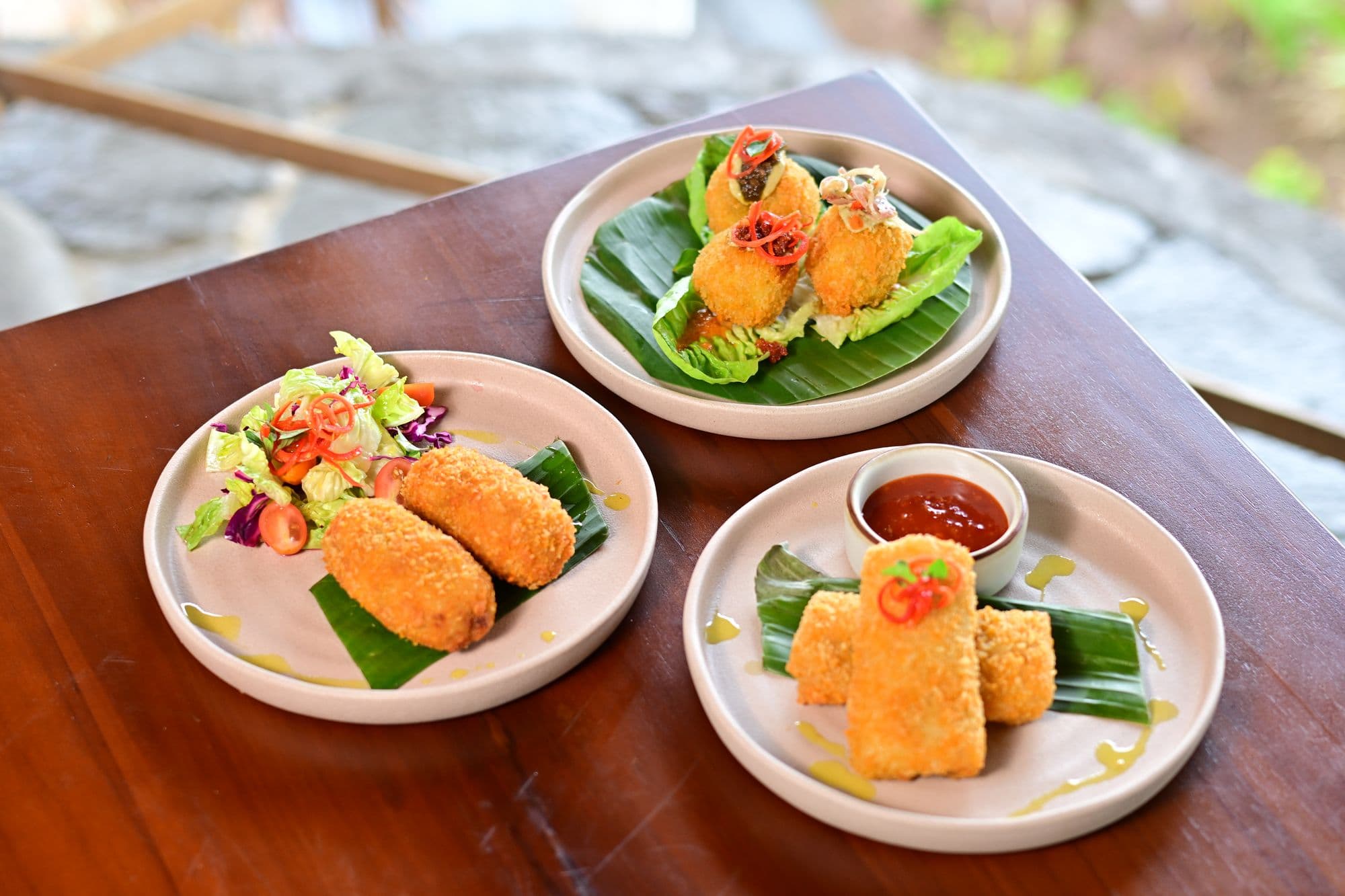 Crisp Indonesian starters served on banana leaf