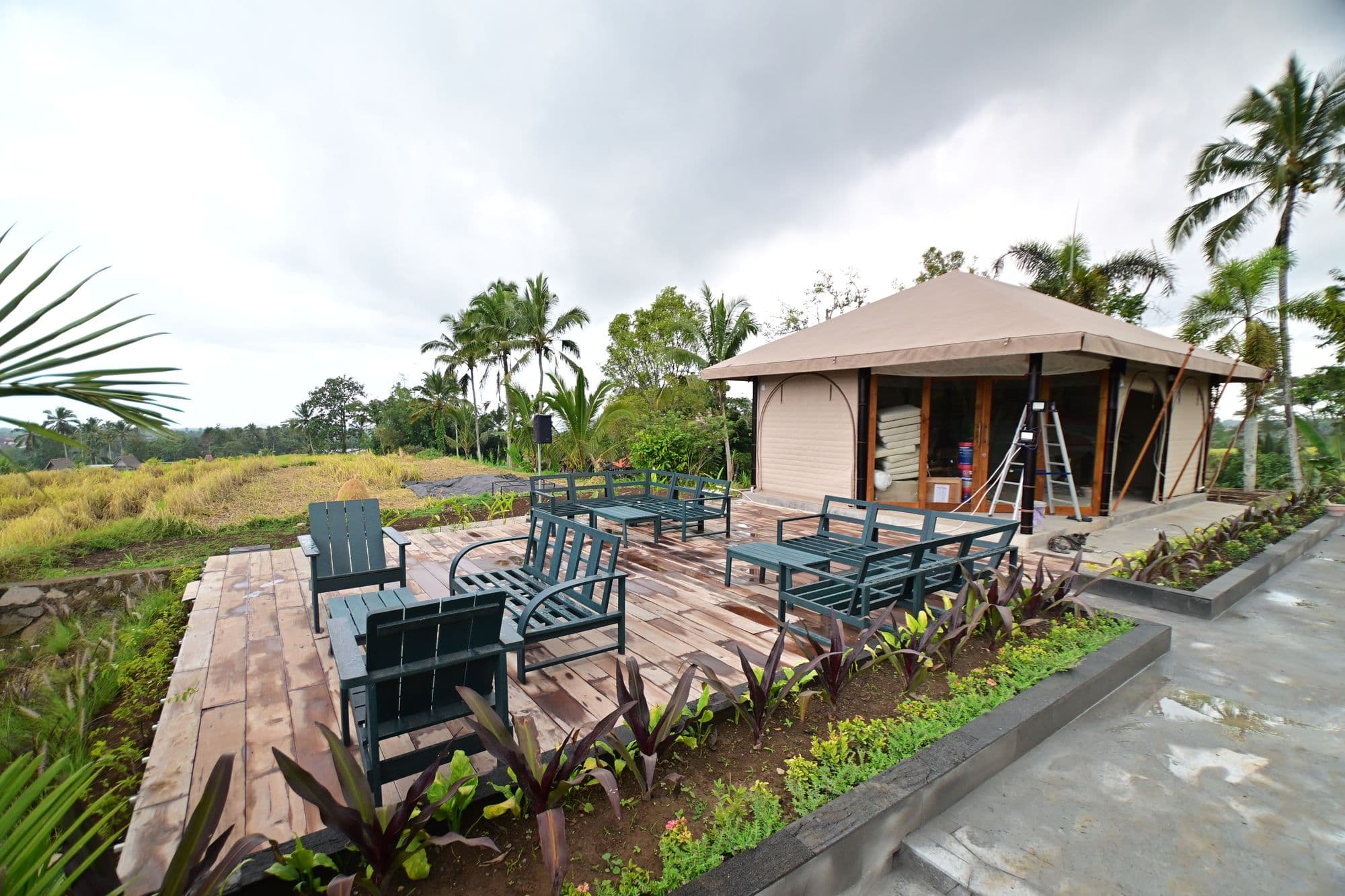 Guest deck and cabin overlooking the rice fields at Spirit Hills