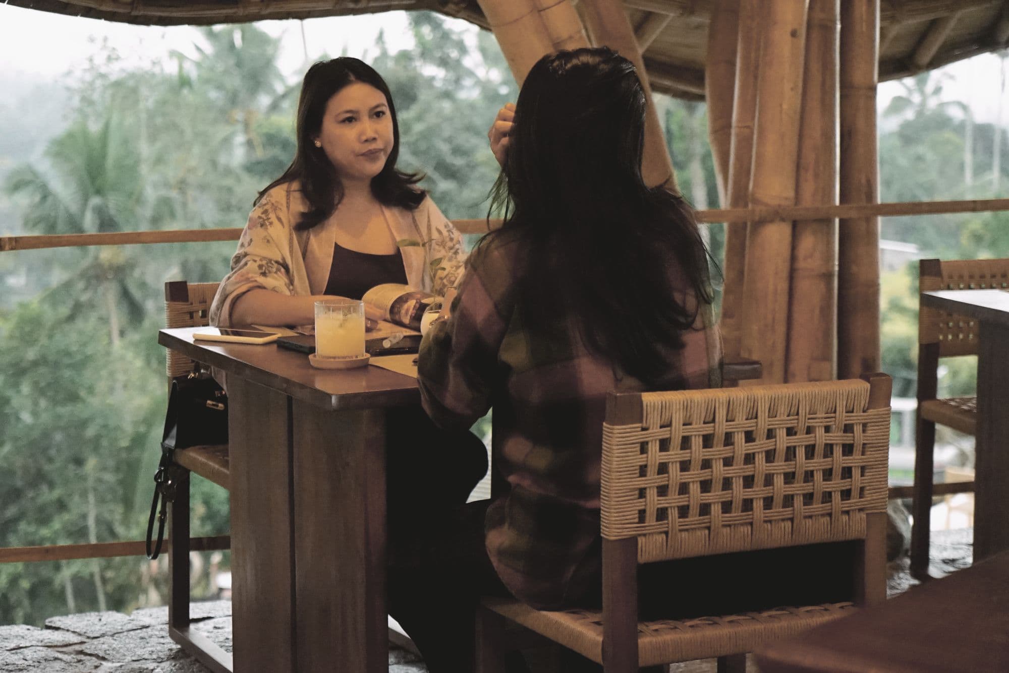 Guests in conversation over coffee at Kayun Shali